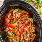 Slow cooker chicken fajitas in crockpot ready to be served.