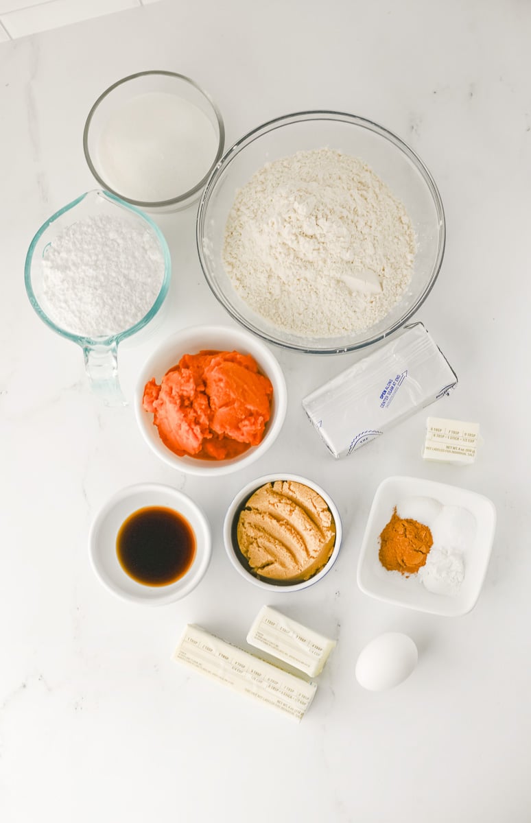 Ingredients for pumpkin cookies with cream cheese frosting.
