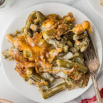 Plate served with slow cooker green bean casserole.