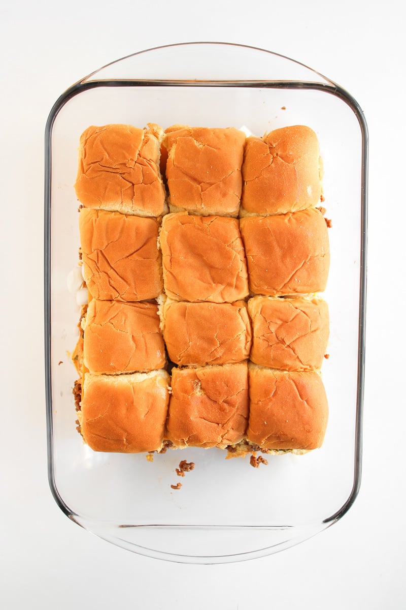 Slider top buns are placed on the meat mixture.