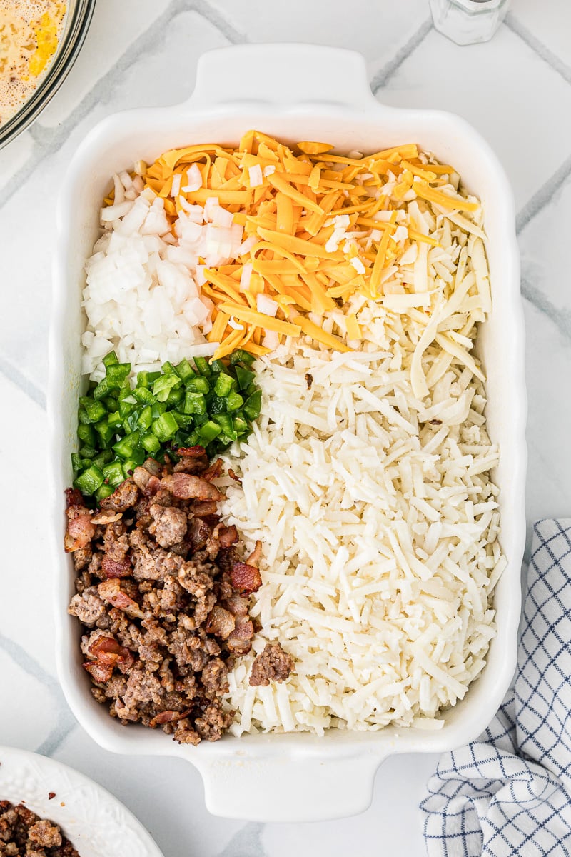 Ingredients are spread into baking dish.