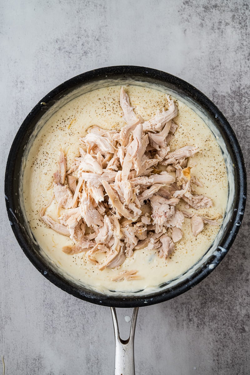 Chicken is added to the skillete.