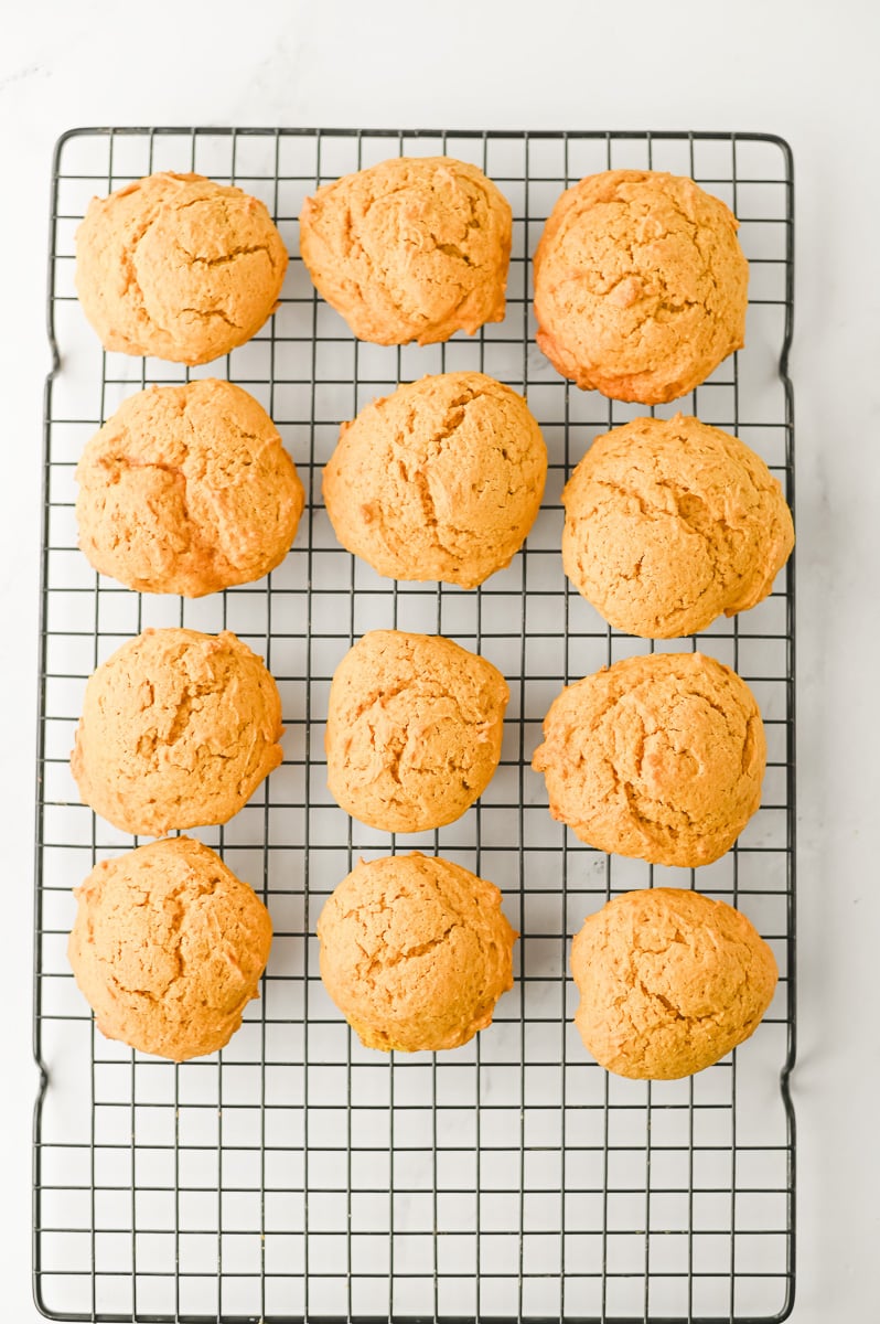 Baked pumpkin spice cookies on cooling rack.