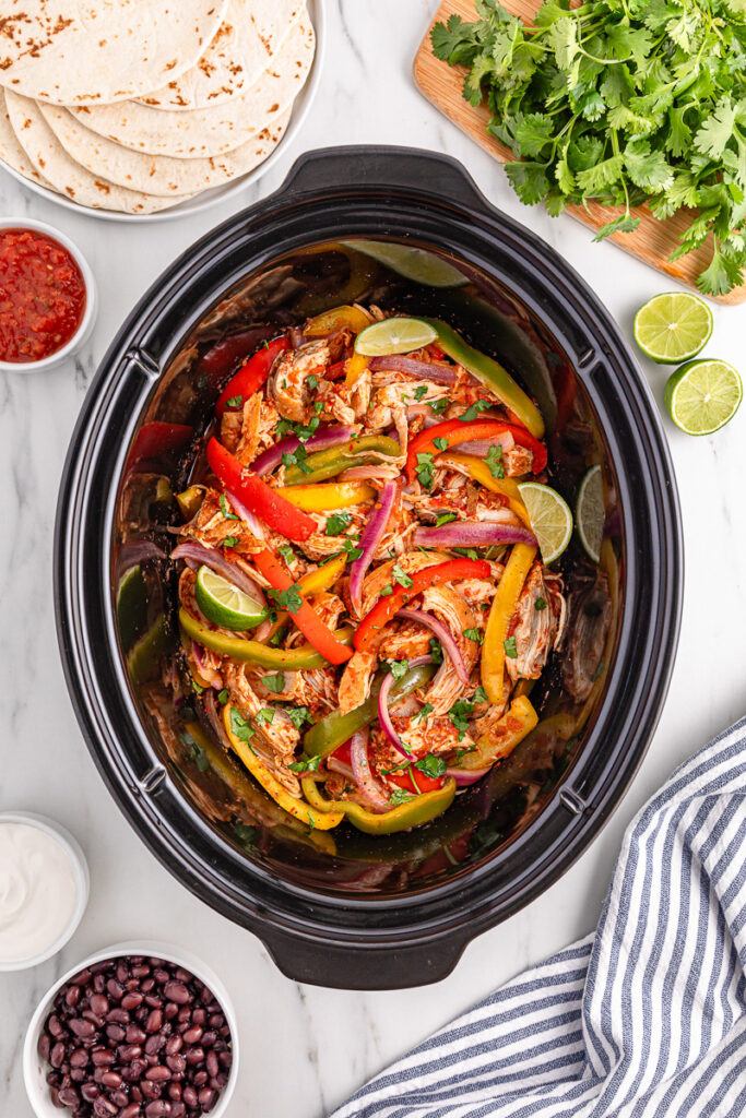 Cooked chicken fajitas in slow cooker.