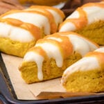 Pumpkin scones on parchment paper.