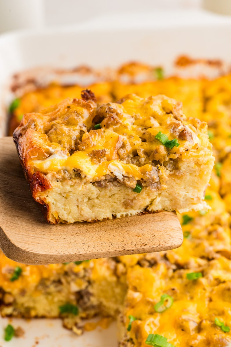 Pancake sausage casserole served on a serving spoon.