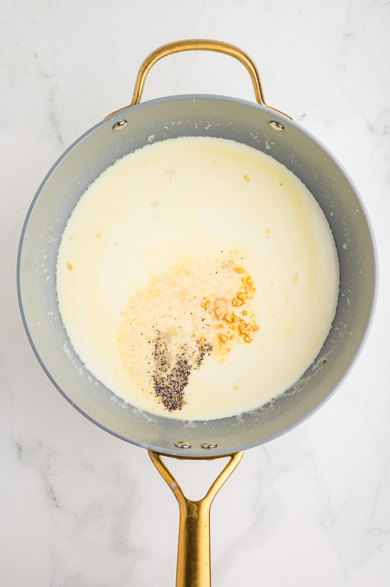 Cream is added to saucepan.