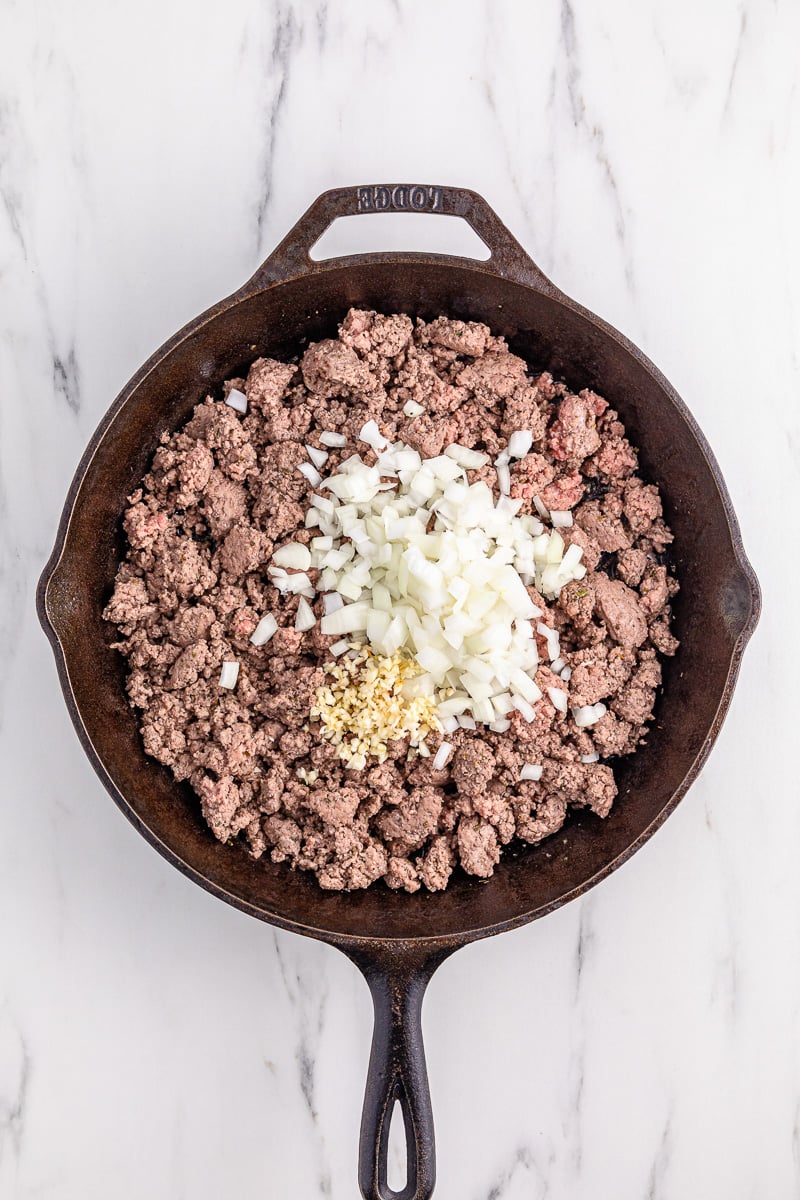Ground beef, onion and garlic in skillet.