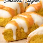 Pumpkin scones on parchment paper.