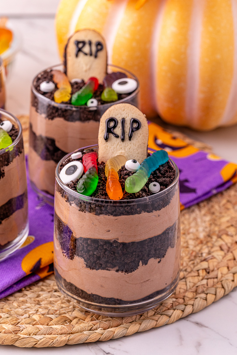 Halloween dessert cups in small glasses ready to serve.