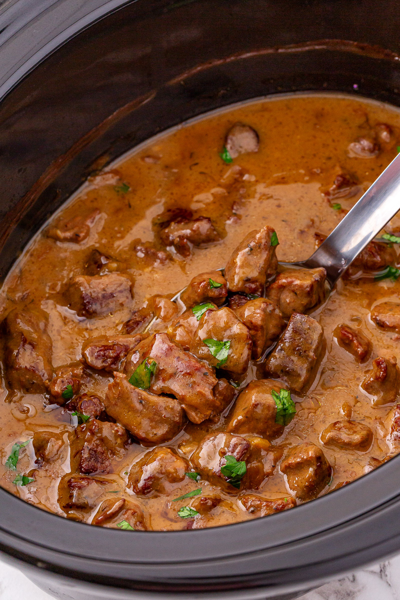 Slow cooker beef tips and gravy in crockpot.