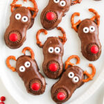 Reindeer nutter butters on a white plate.