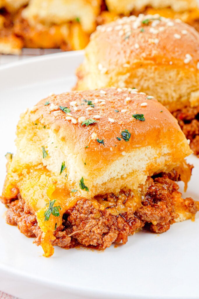 Sloppy Joe sliders served on a white plate.