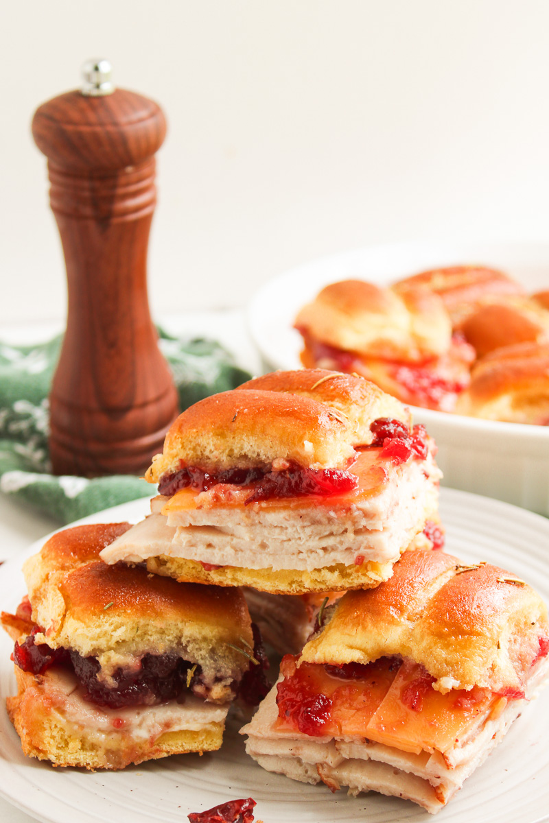 Turkey cranberry sliders on a plate.