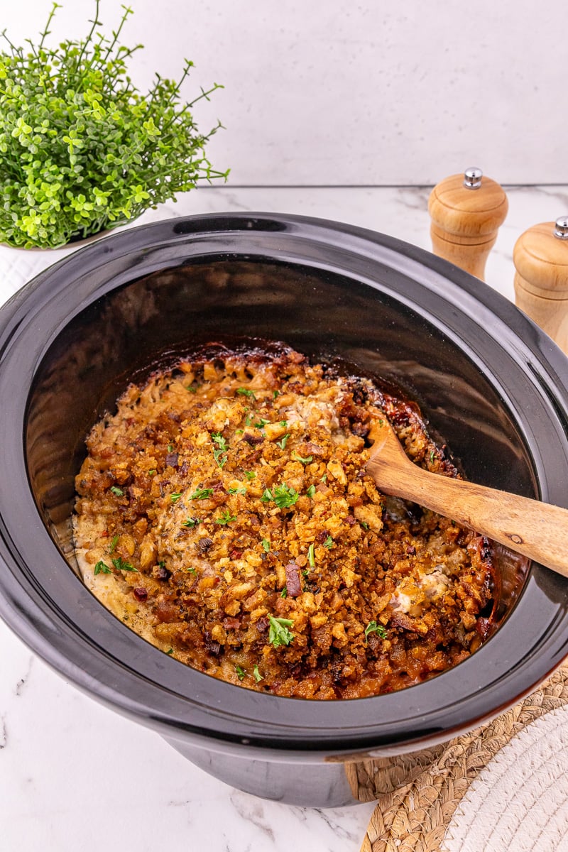 Finished dish of crockpot pork chops and stuffing.