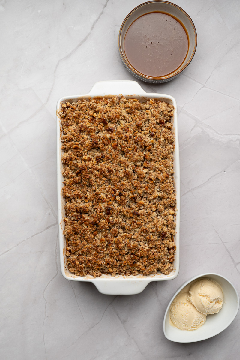 Baked apple cirsp in baking dish, ready to be served.