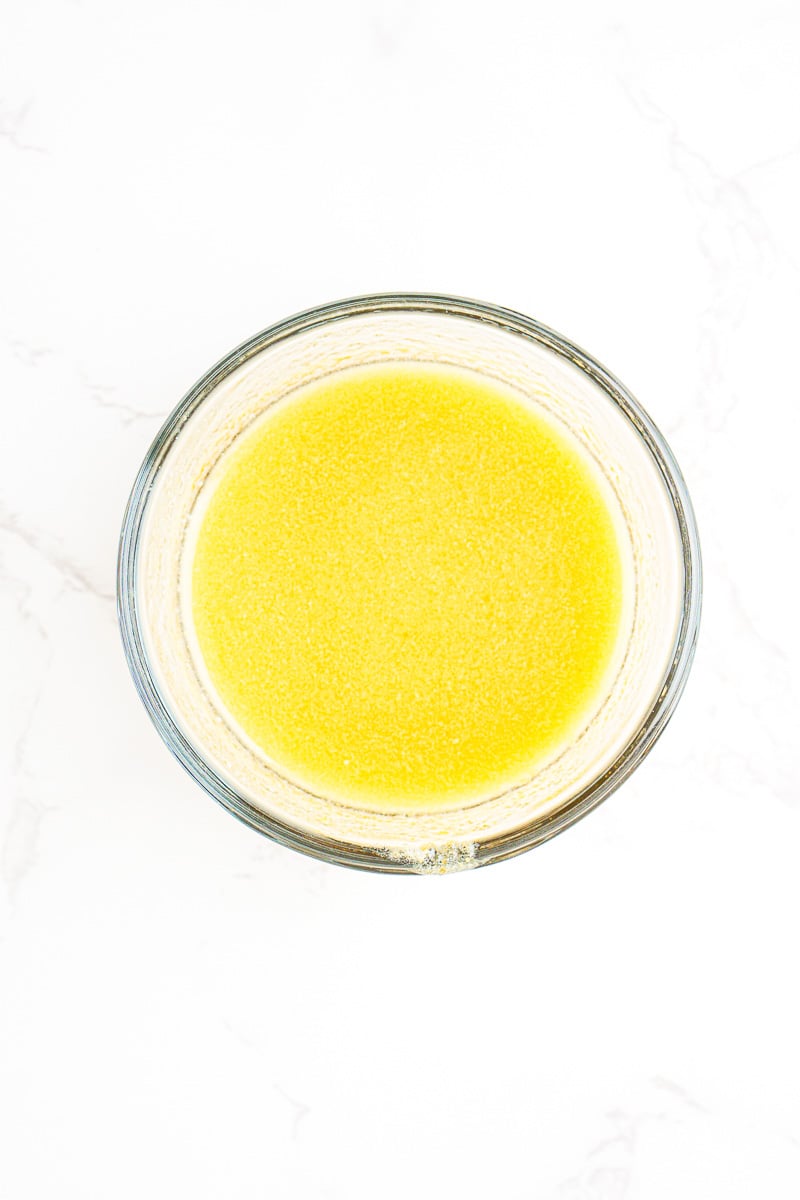 Melted butter in glass dish.