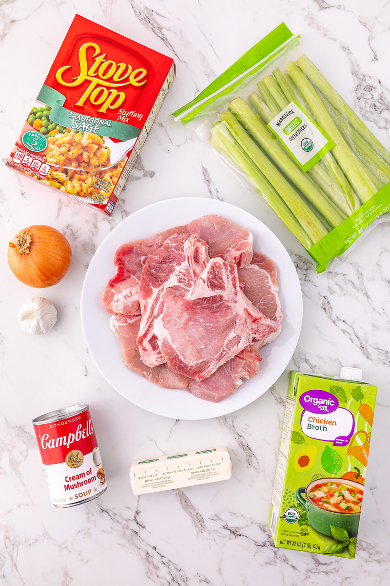 Ingredients for pork chops with stuffing on kitchen counter, prepped for the recipe.