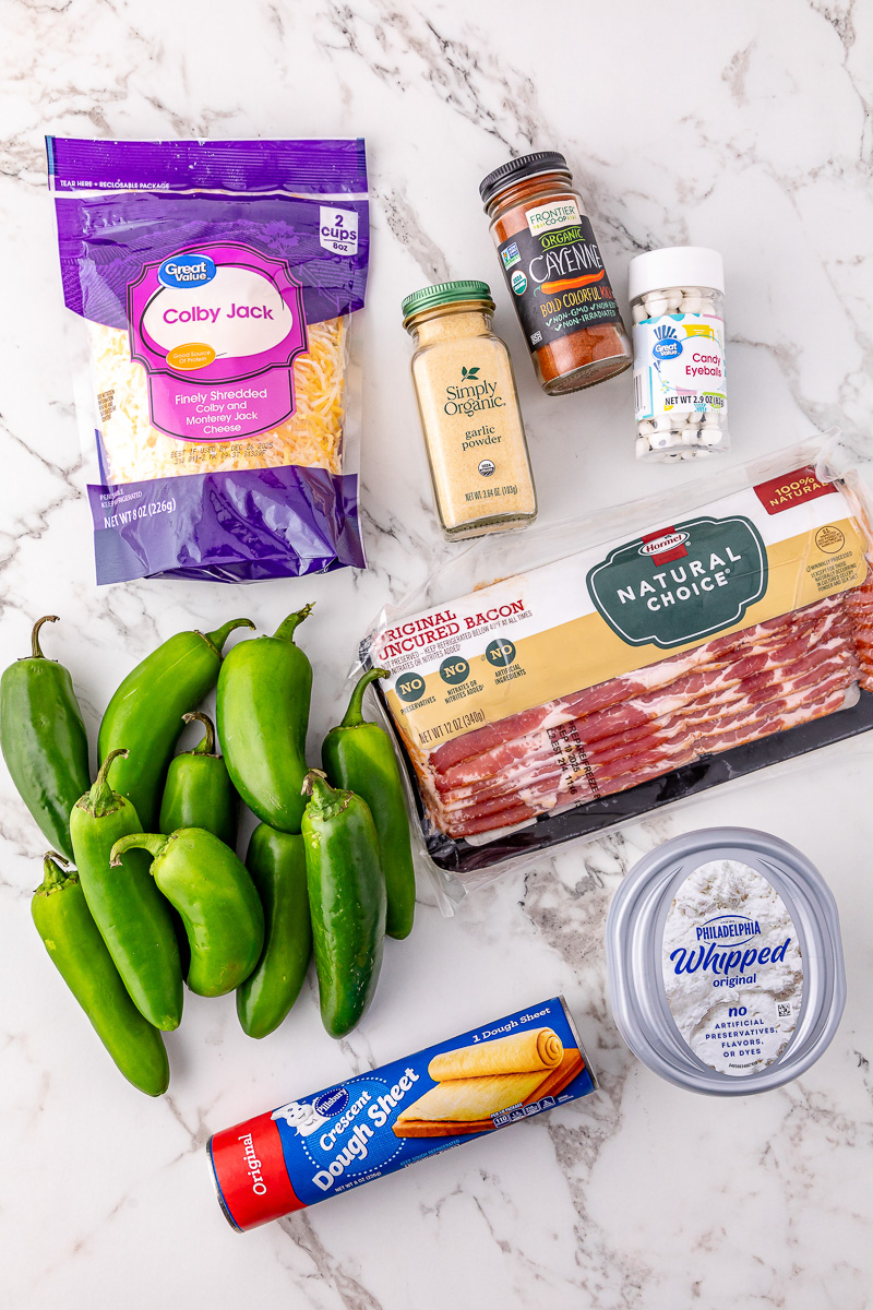 Ingredients for jalapeno popper mumies on kitchen counter.