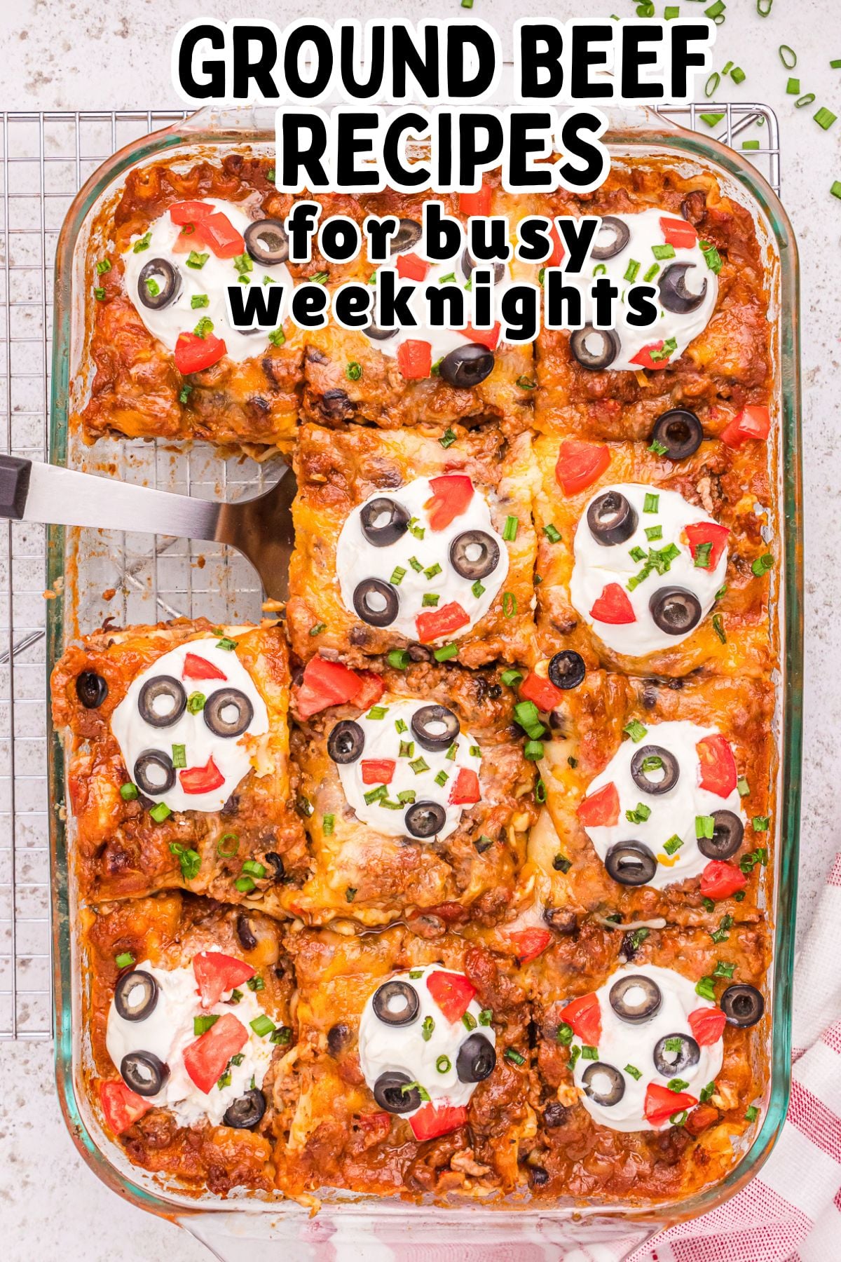 Mexican lasagna overhead view of casserole dish with one piece removed.