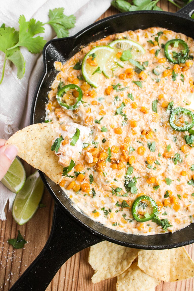 Mexican street corn dip in cast iron skillet.