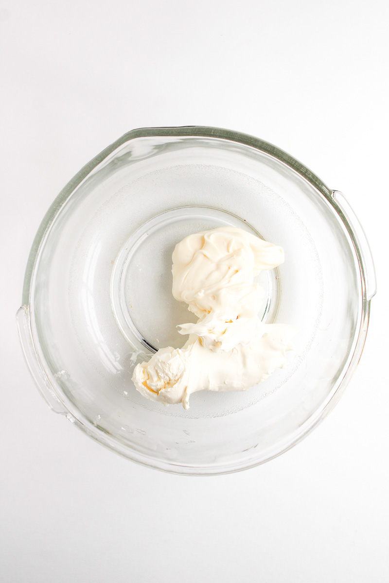 Cream cheese in mixing bowl.