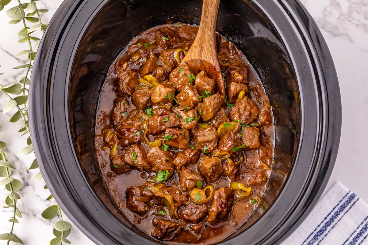 Finished dish of Mississippi steak bites in slow cooker.
