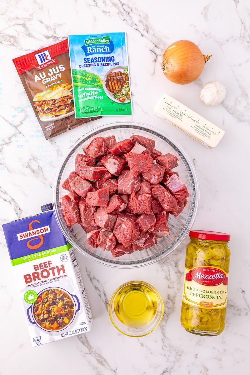 Ingredients for Mississippi steak bites prepared on kitchen counter.