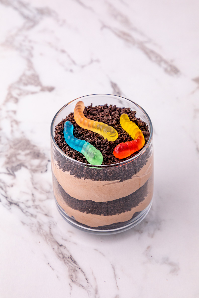 Gummy words are sprinkled on top of the dirt cup as garnish.