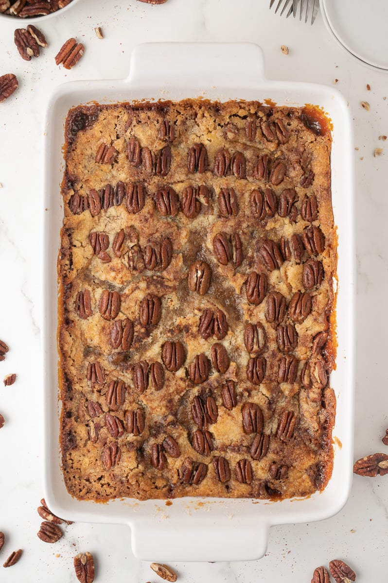 Baked dump cake ready to cool is fresh from the oven in baking dish.