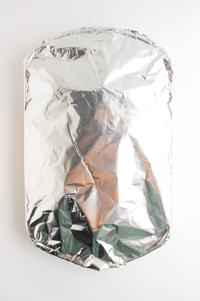 Sliers are werapped in foil before placing in oven.