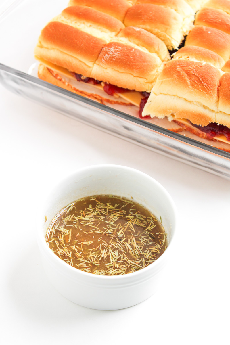 Melted butter in white bowl.