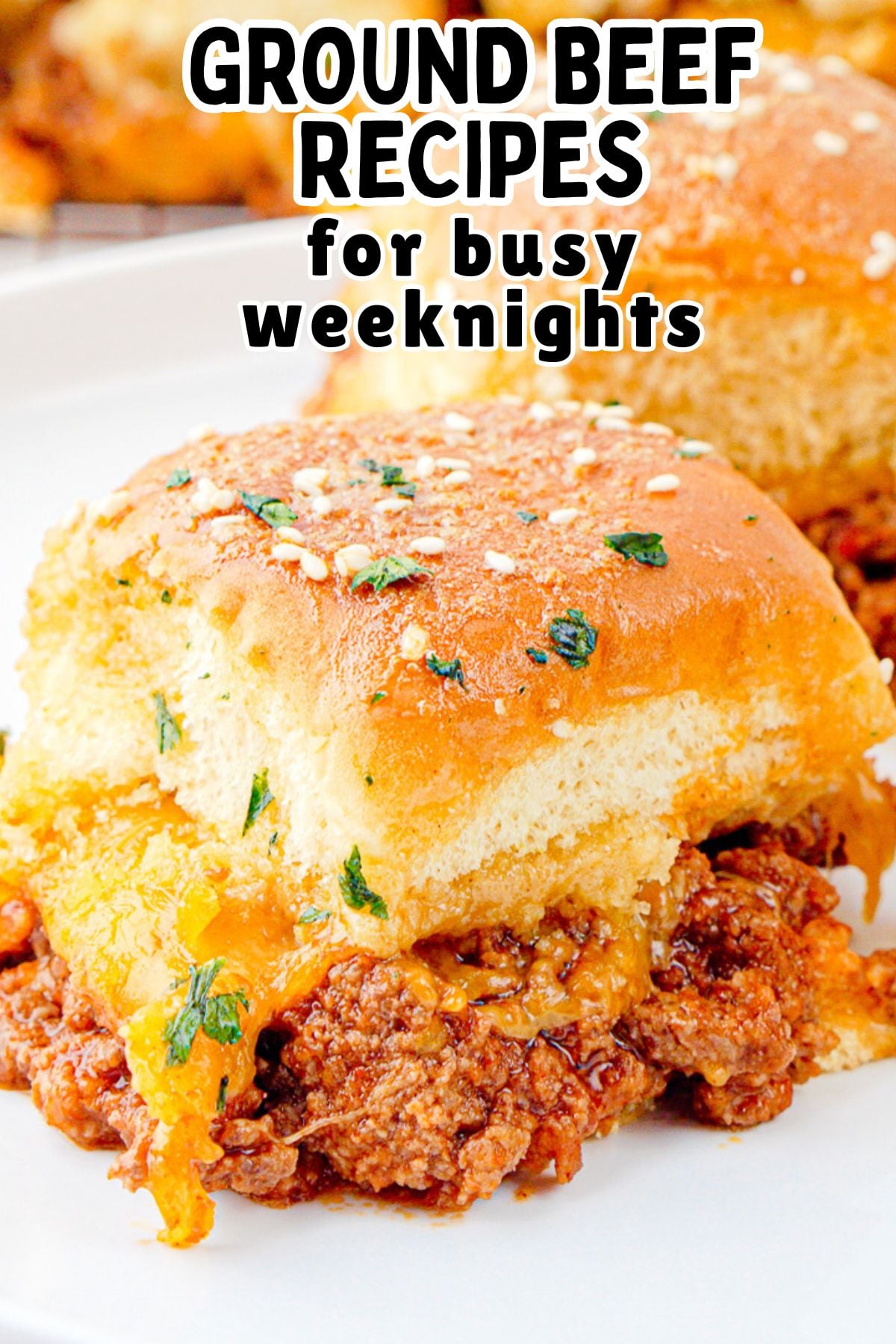 Sloppy oe sliders served on a white plate.