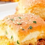 Sloppy joe sliders on a white plate.