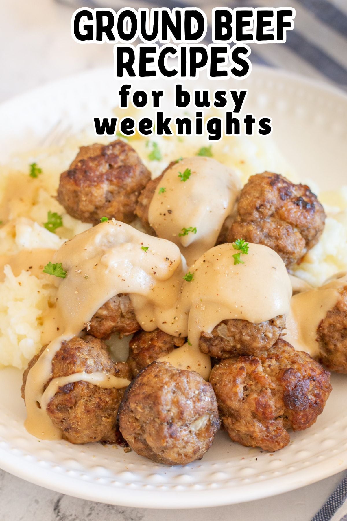 Swedish meatballs served on a plate with mashed potatoes.