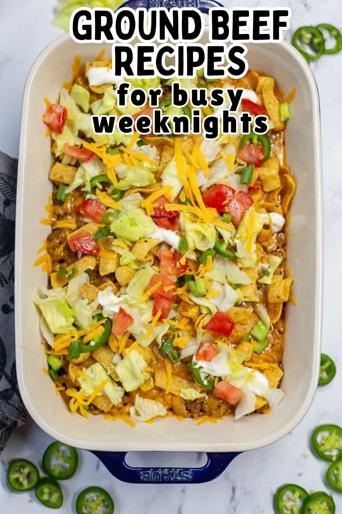 Overhead view of walking taco bake in casserole dish.