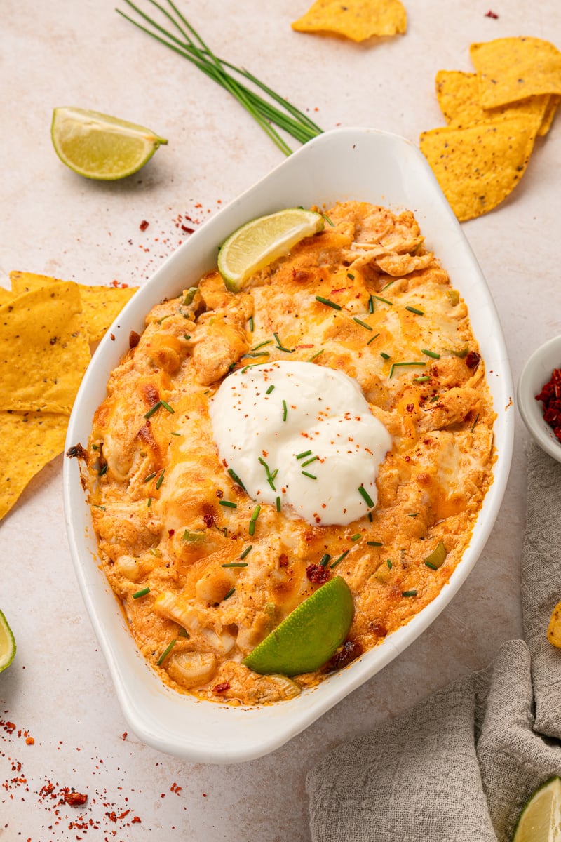 Buffalo chicken dip in bow with crackers on the side.