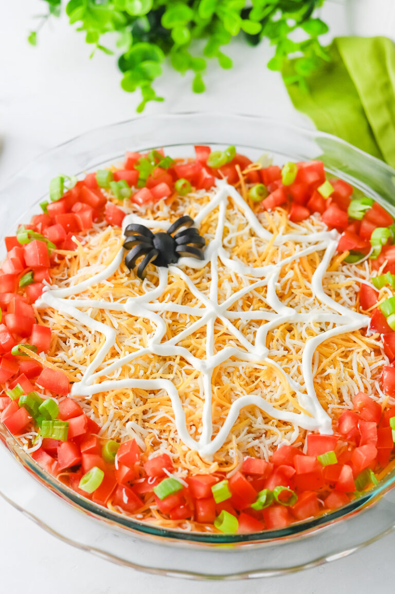 Halloween party taco dip in pie plate.