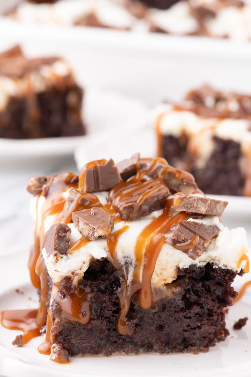 Piece of better than anything cake on a white plate, one of the best Thanksgiving desserts for non pumpkin lovers.