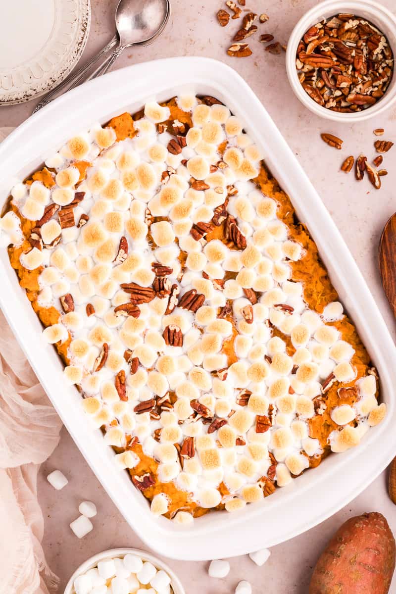 Overhead view of sweet potato casserole in white baking dish.