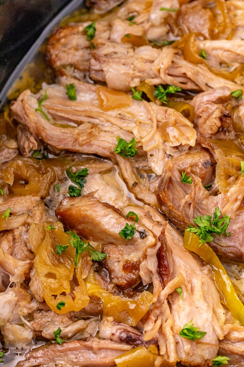 Close up image of Mississippi pork roast in crockpot.