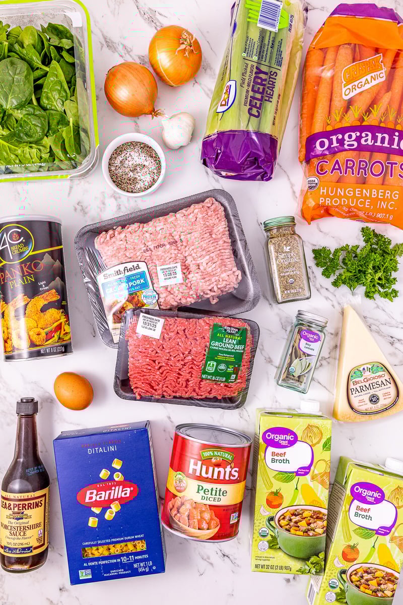 Ingredients for meatball soup laid out on counter in preparation for the recipe.