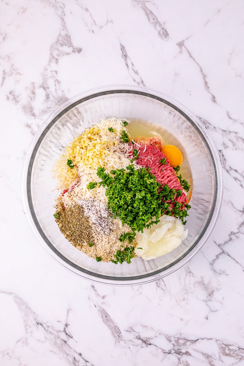 Meatball ingredients in small bowl.