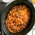 Cooked taco casserole in slow cooker.