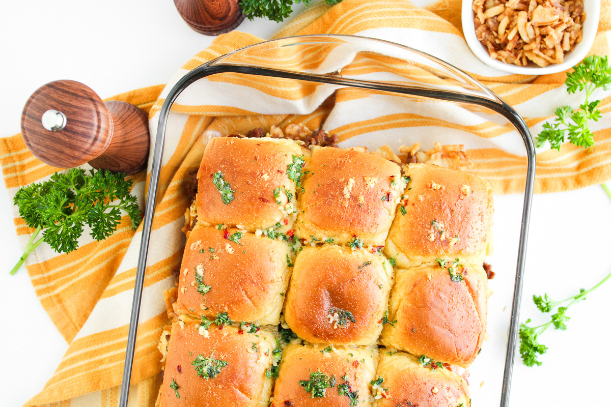 Cowboy sliders in baking dish ready to go into the oven.