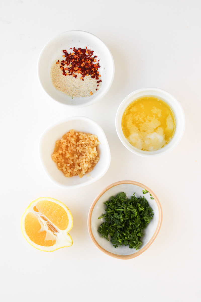 Sauce ingredients for cowboy sliders in small bowls on counter prepped for the recipe.