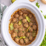Finished dish of crockpot Mississippi meatballs in crockpot.