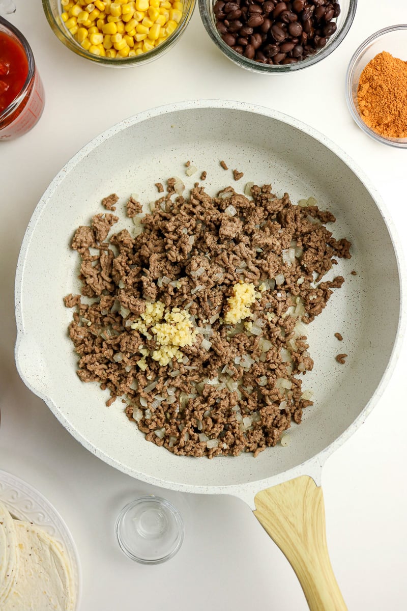 Ground beef, onion and garlic in skillet.