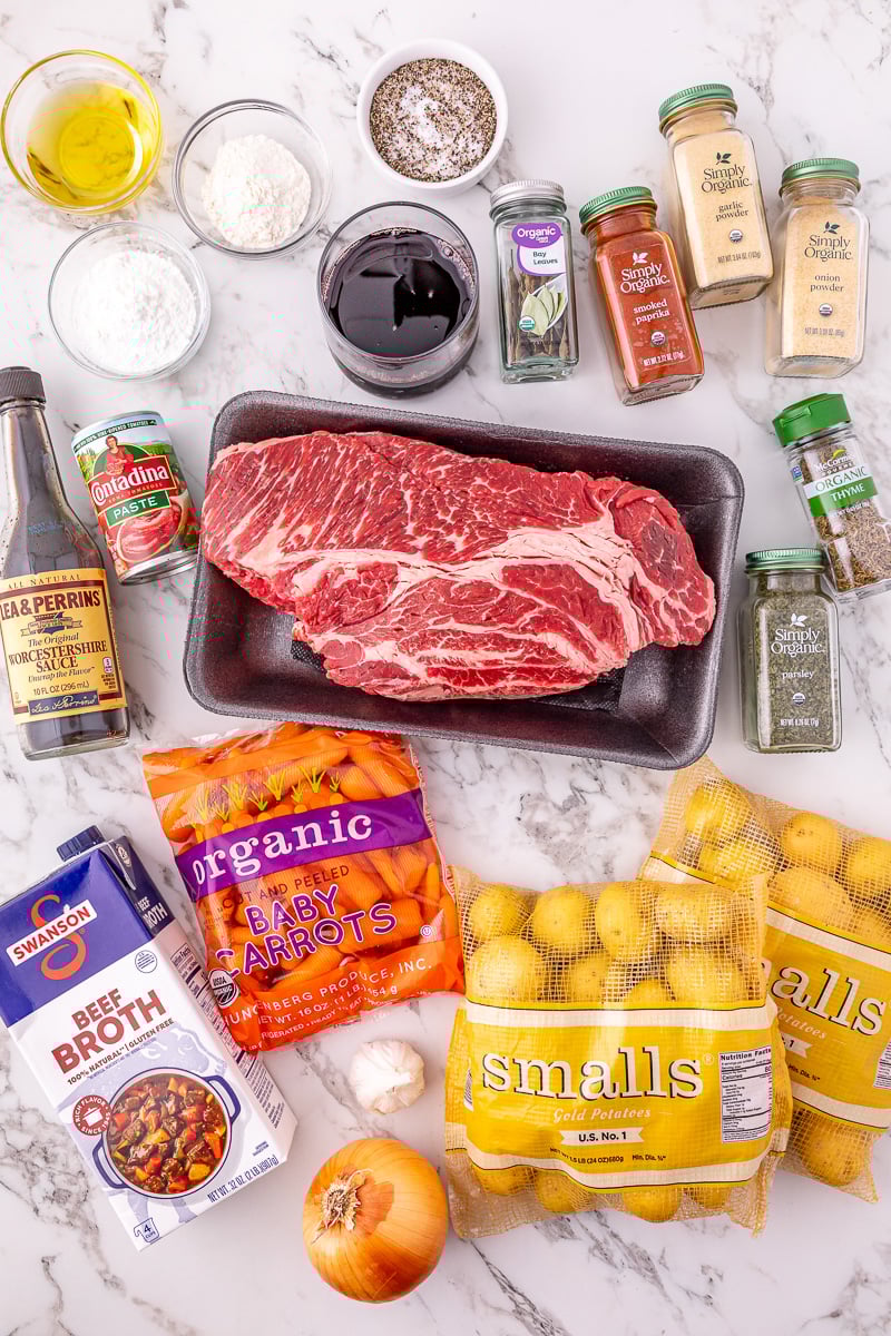 Ingredients for slow cooker pot roast on kitchen counter ready for the recipe.