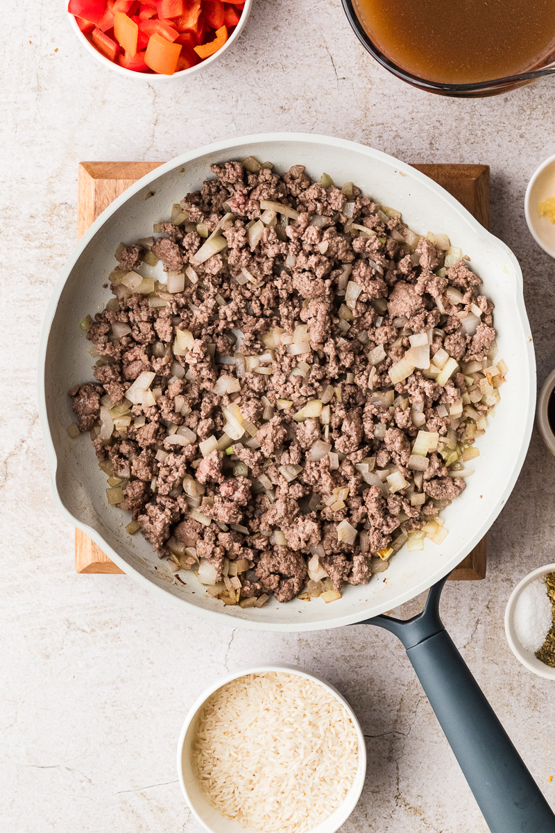 Cooked ground beef in skillet.